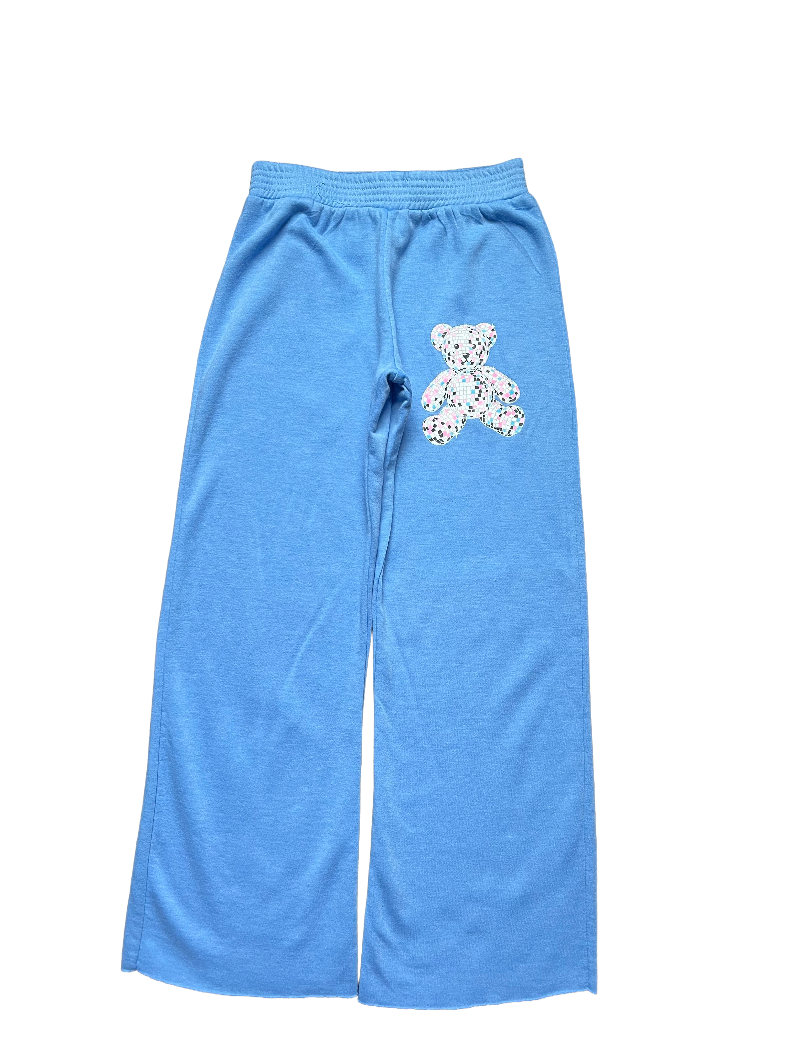 Blue sweatpants with a teddy bear design on a white background
