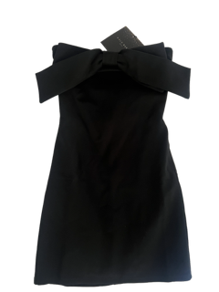 Black dress with a bow detail on a white background